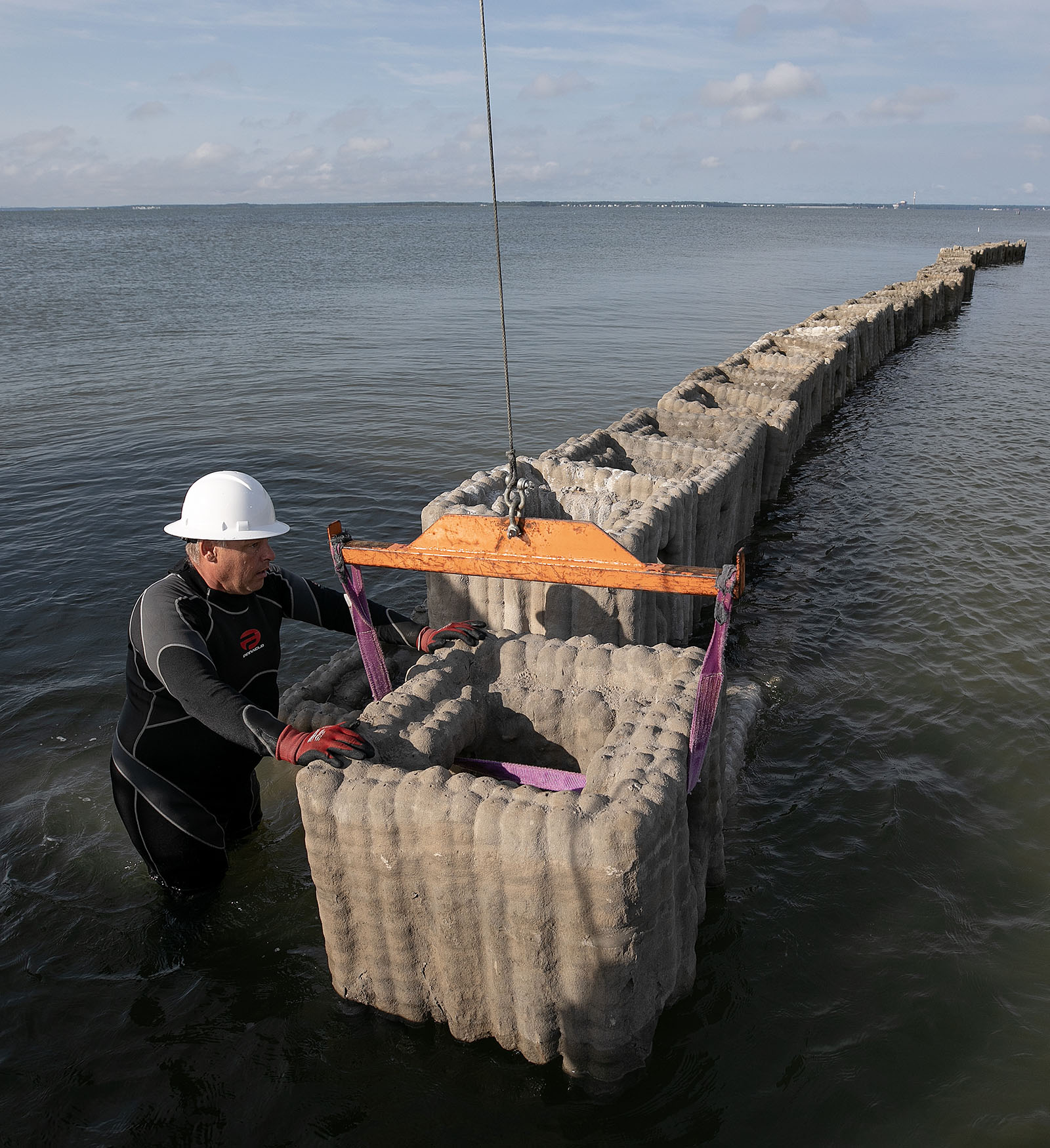 Reefs are being placed along the Guinea marsh to protect the islands from erosion Saturday August 5, 2023.